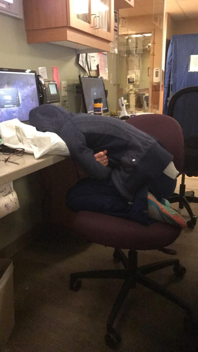 My coworker finds interesting ways to sleep on night shift in the hospital.