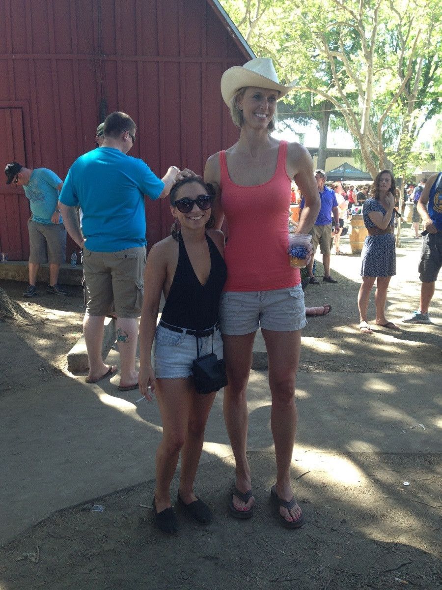 This woman insisted taking a picture with me. I'm 4'8".