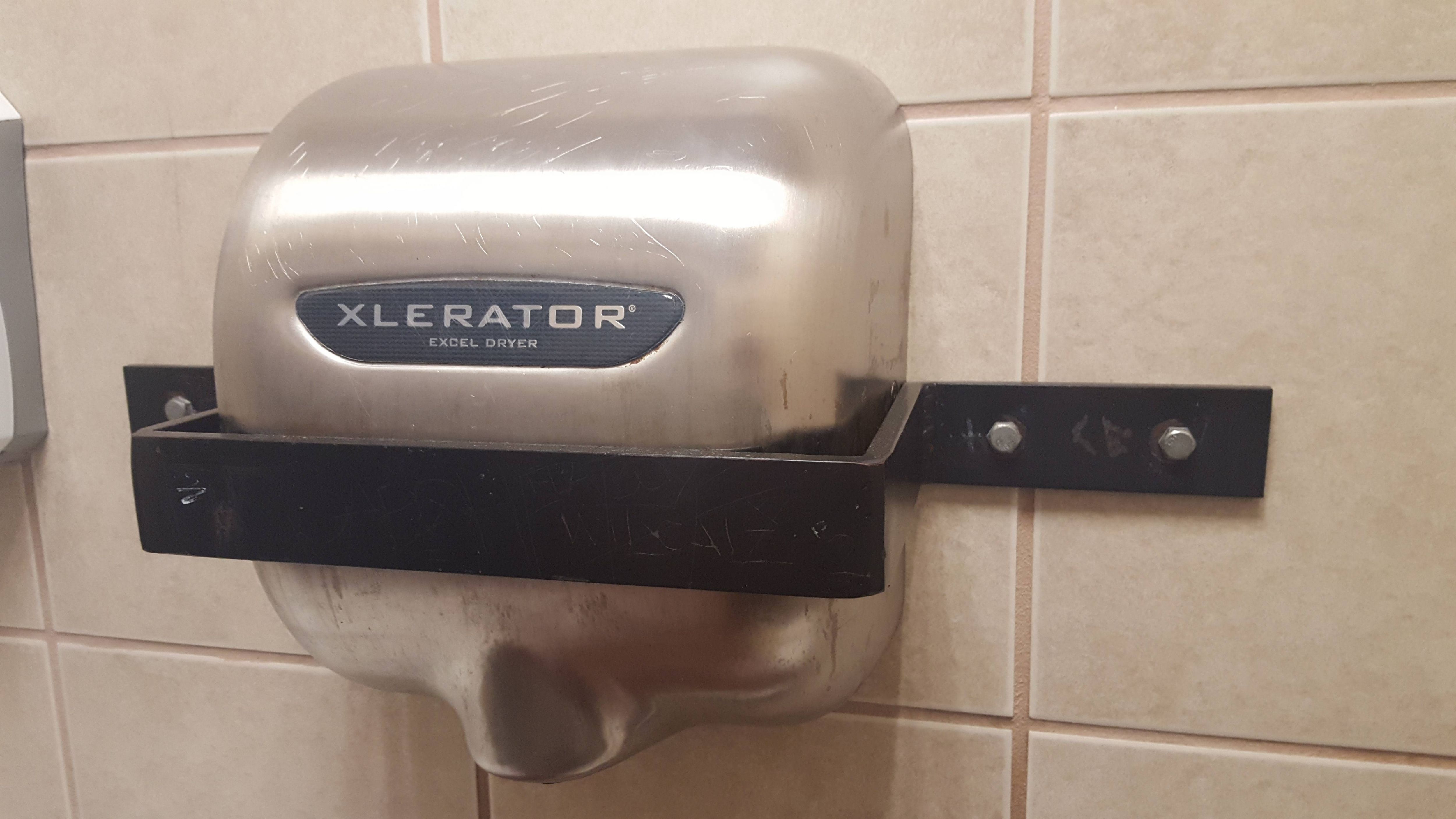 You may be in a bad neighborhood when you are afraid of someone stealing your gas station hand dryer.