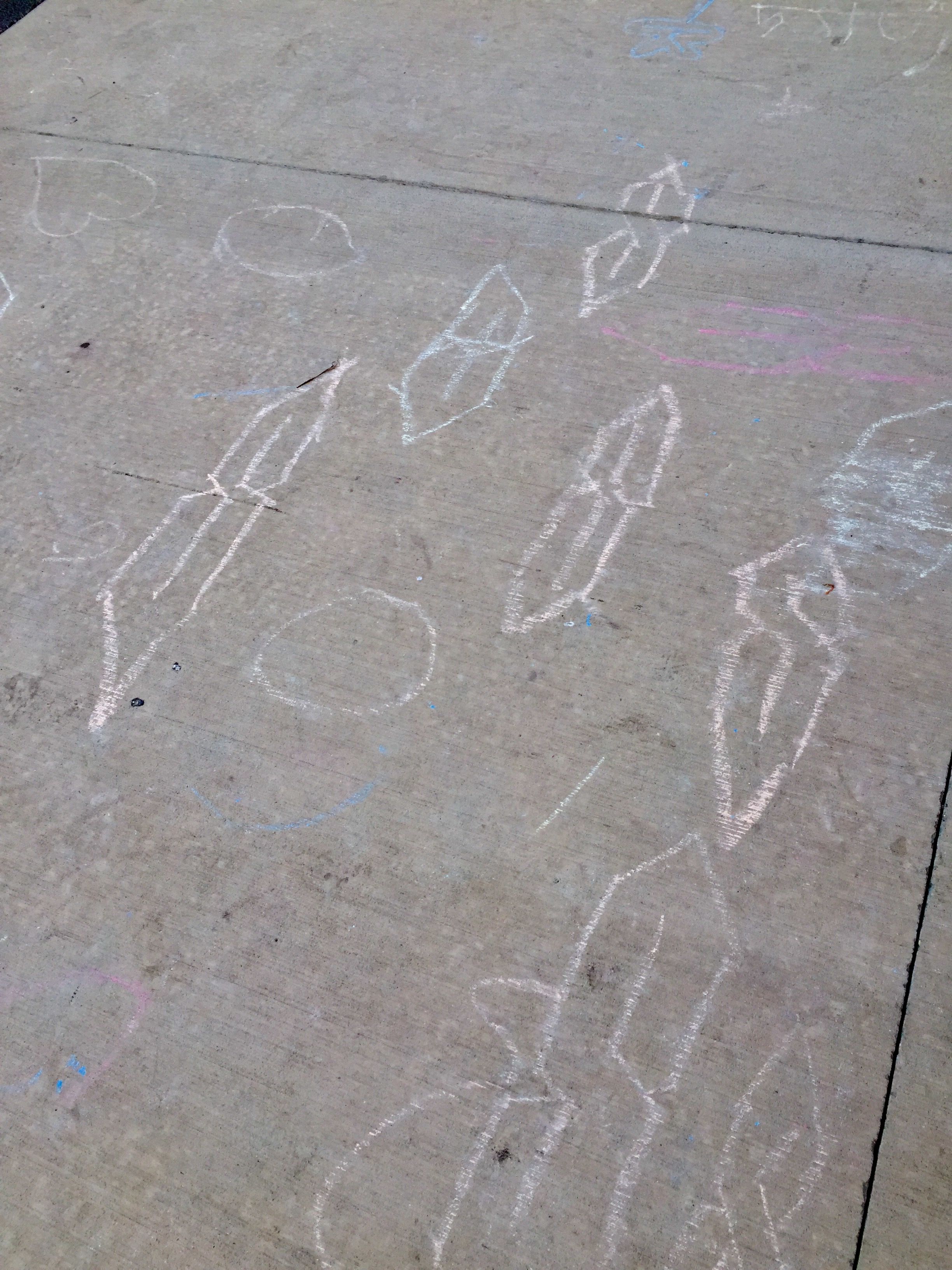 On an elementary school sidewalk, mysterious symbols from ancient times have appeared.
