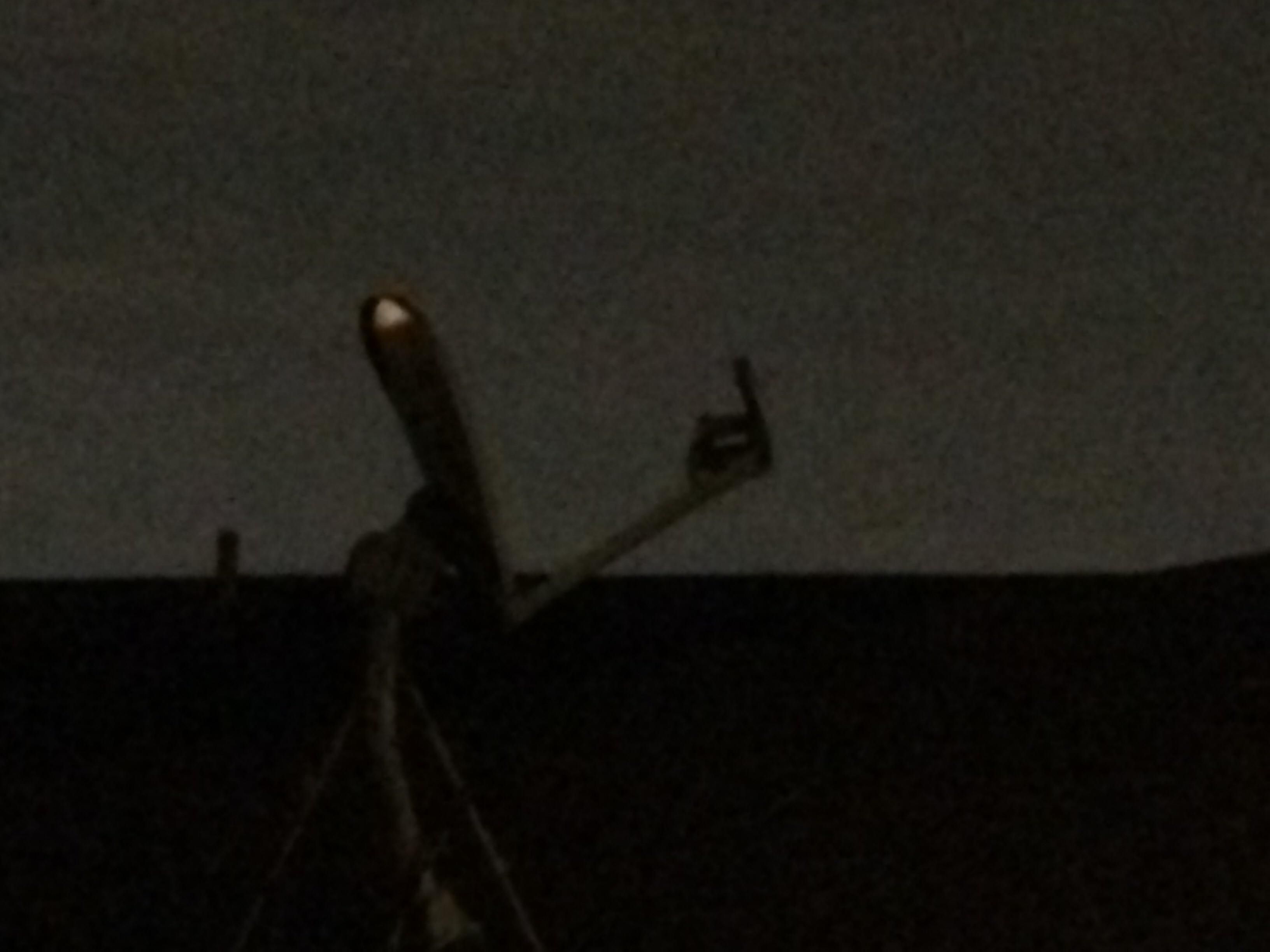 My neighbor's satellite dish looks like it's giving someone the finger.