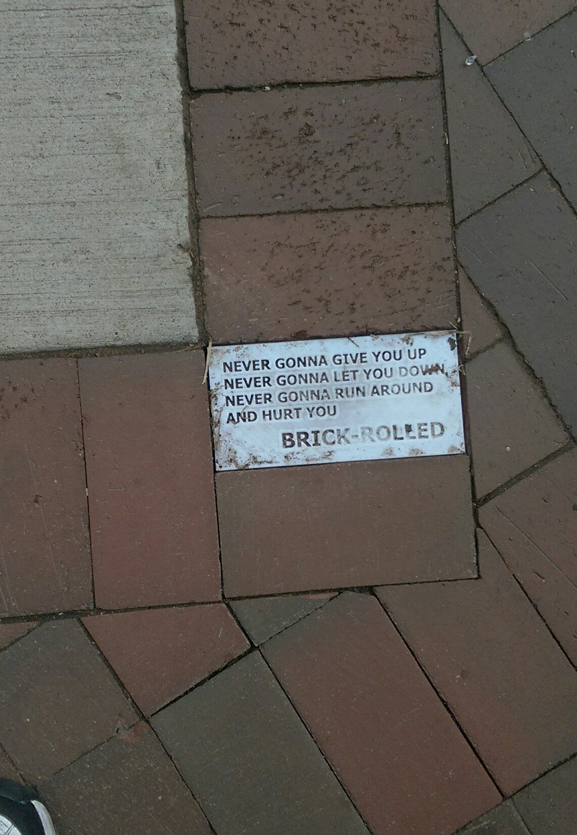 Someone filled in a missing brick with this