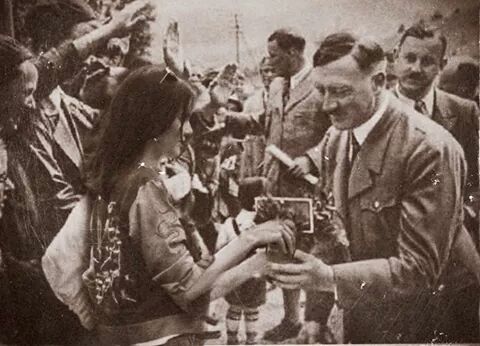 Kendall Jenner offerd a Pepsi to Hitler.