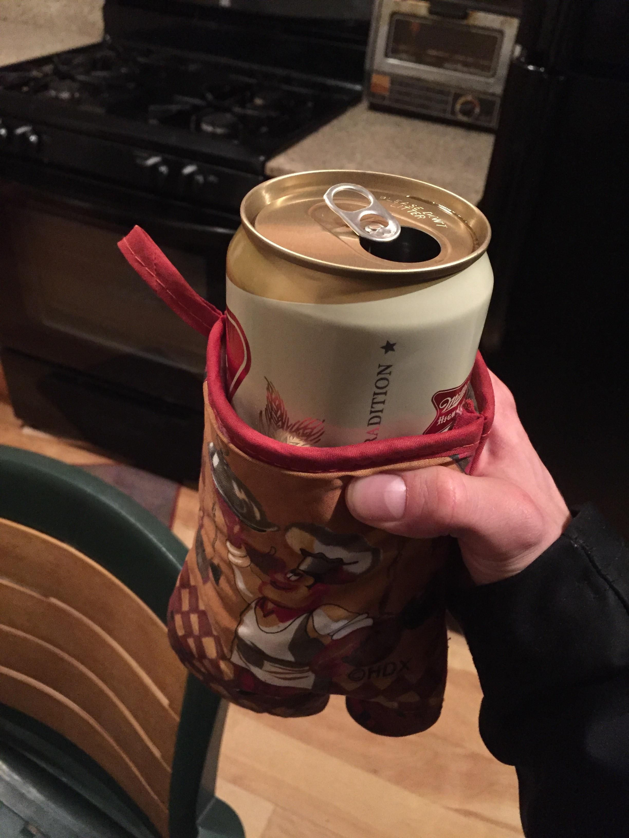 I jokingly asked my buddy for a coozy that would fit a 32oz can. Without missing a beat he threw me an oven mit.