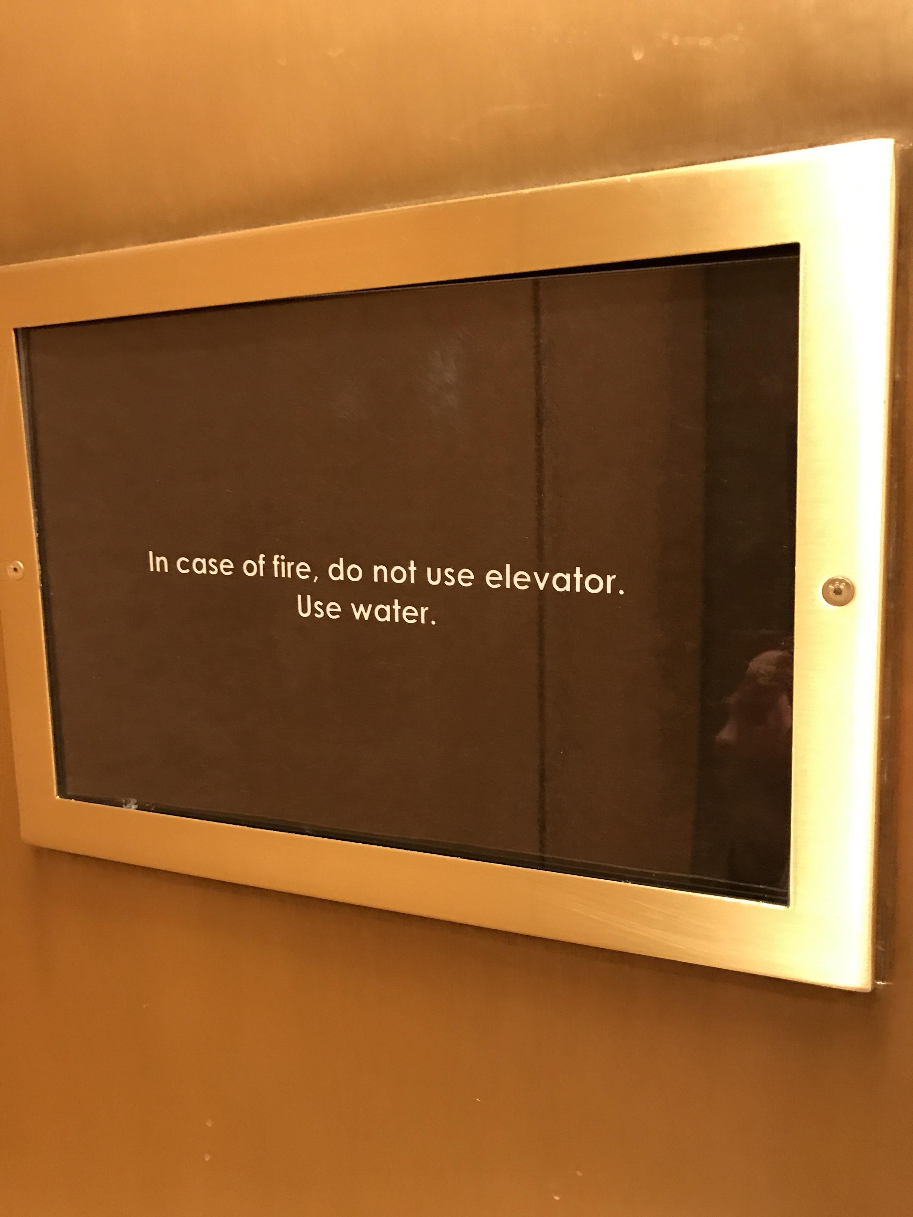 Sign inside an elevator.