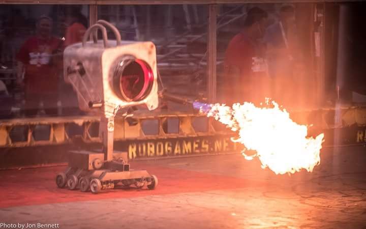 Someone submitted a giant version of the Rick and Morty butter passing robot to a BattleBots style tournament