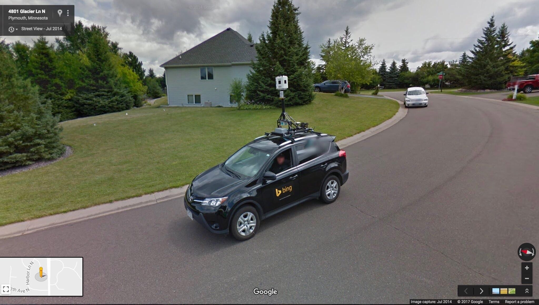 A google car and a bing car passed each other while recording