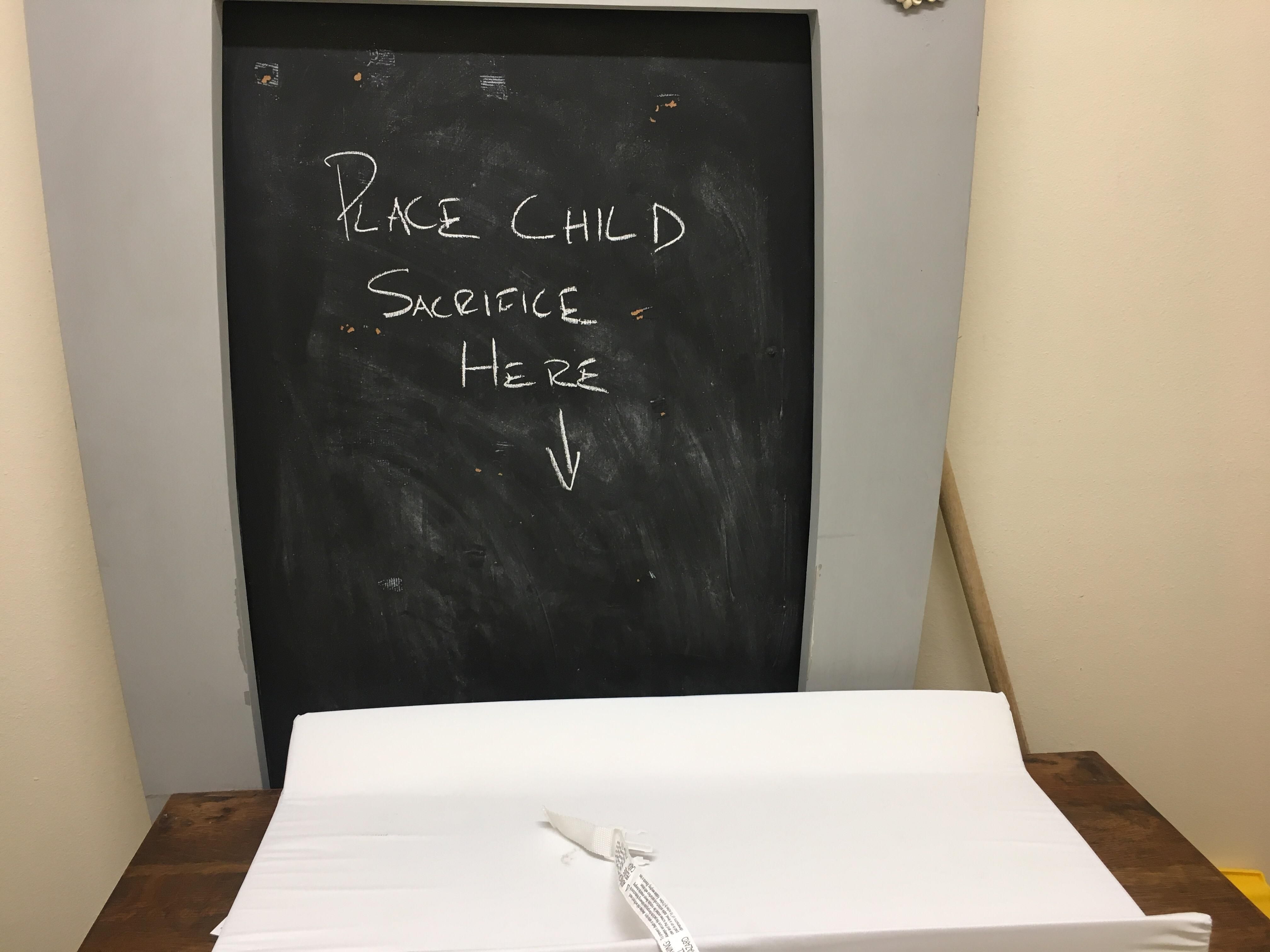 The coffee shop had a chalkboard over the changing table. How could I not?