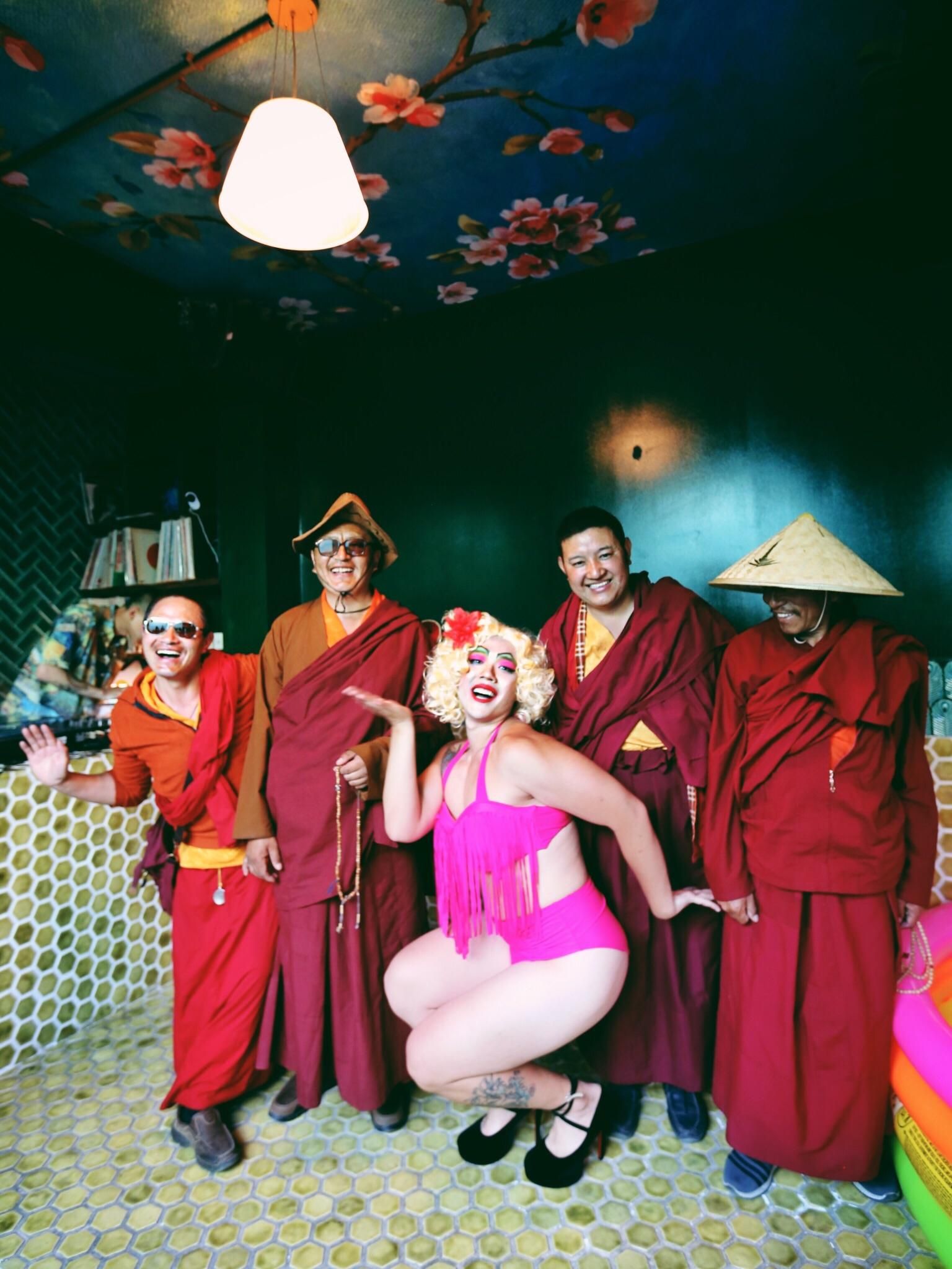4 random Tibetan monks came into my drag show in Beijing after hearing music and laughter. The rest just happened naturally. The guy on the left is a natural.