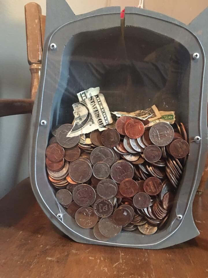 My 4 year old niece found a dollar and said it didn't fit in the coin slot so she had rip it up.