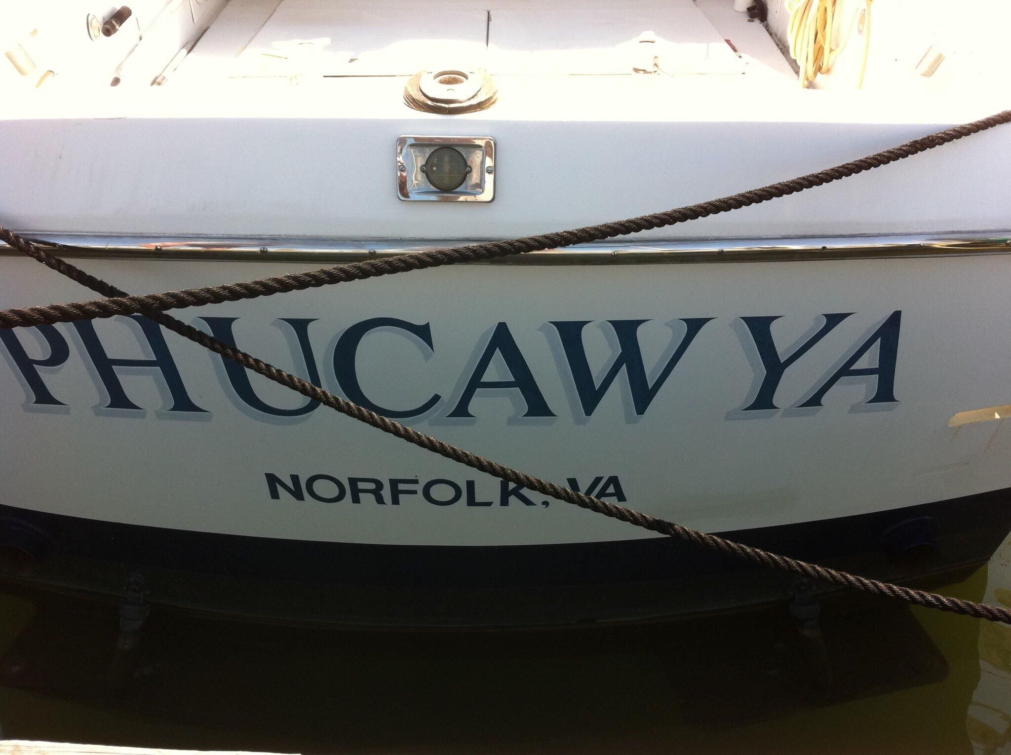 A local artist hand paints boat names, he does it for free if you let him name the boat. Here is one of his freebies.