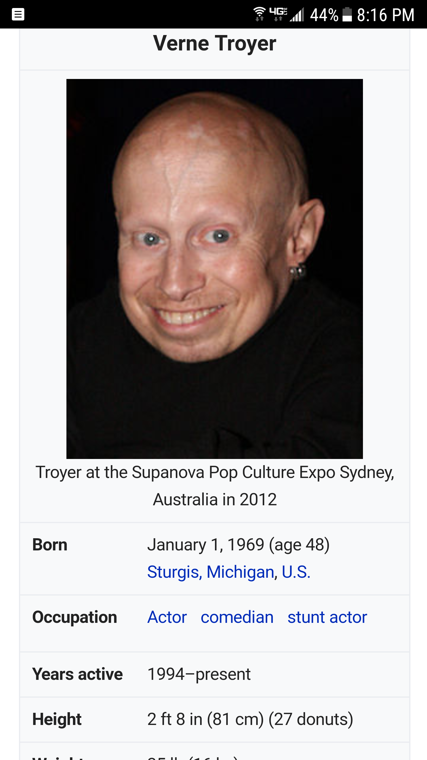 Verne Toyer's Wikipedia page lists him as being 27 donuts tall
