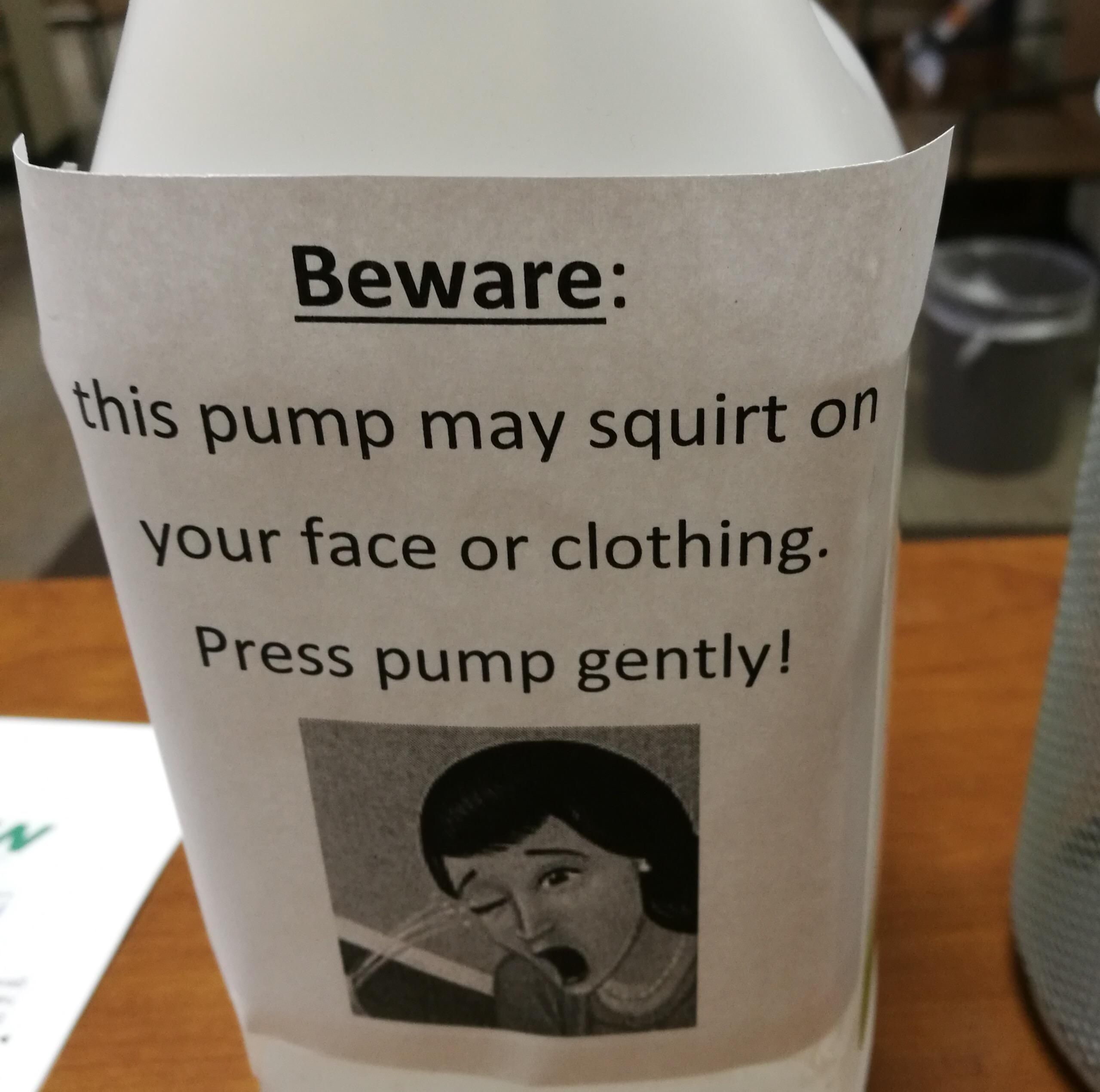 Ill advised but hilarious warning sign on the hand sanitizer dispenser at work.