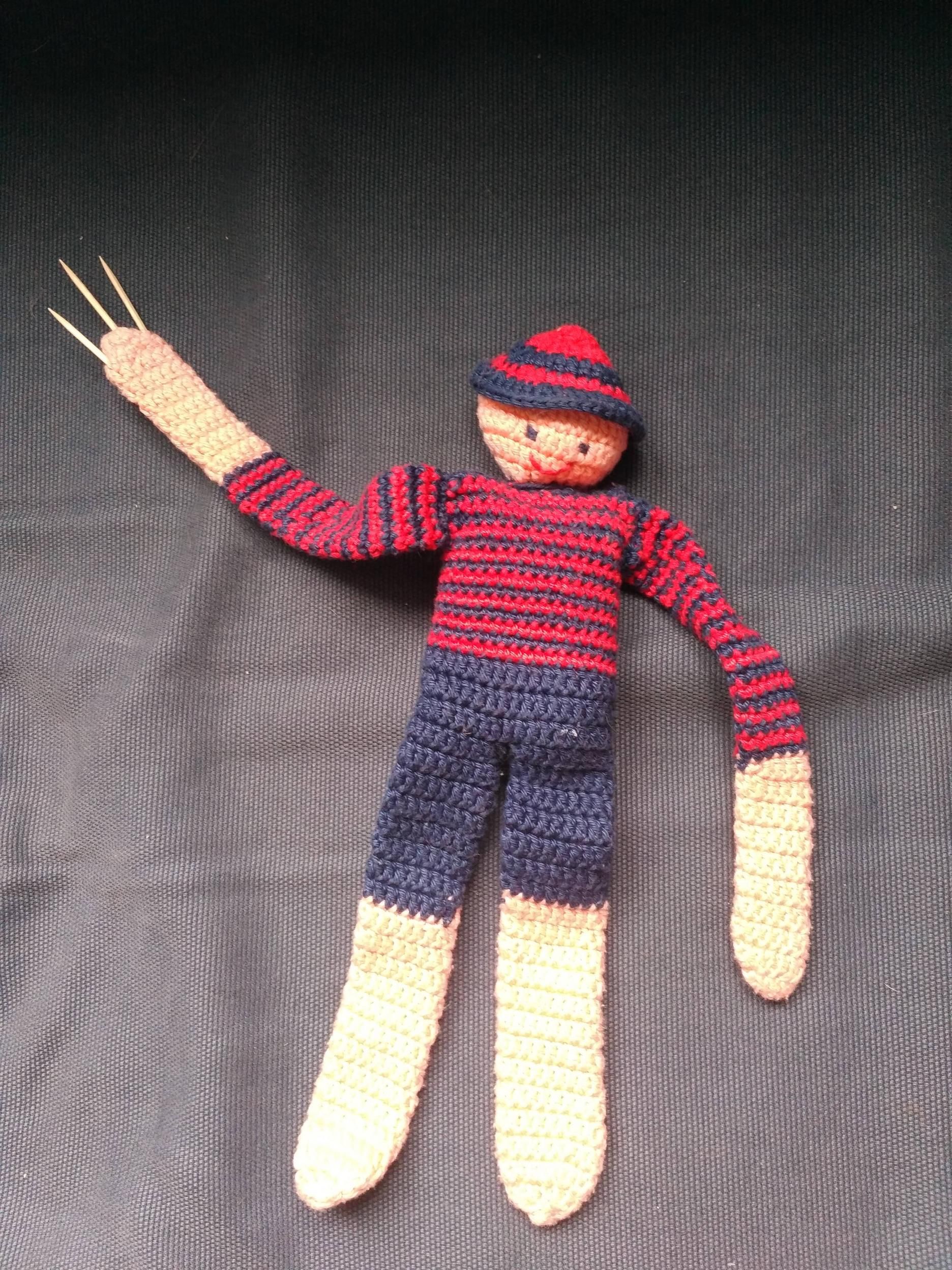 My aunt made a knitted toy for my son. I added toothpicks.