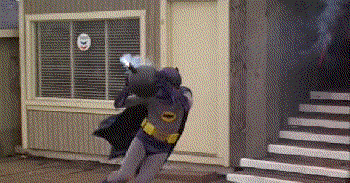 Adam West as Batman doing what Batman does under pressure!