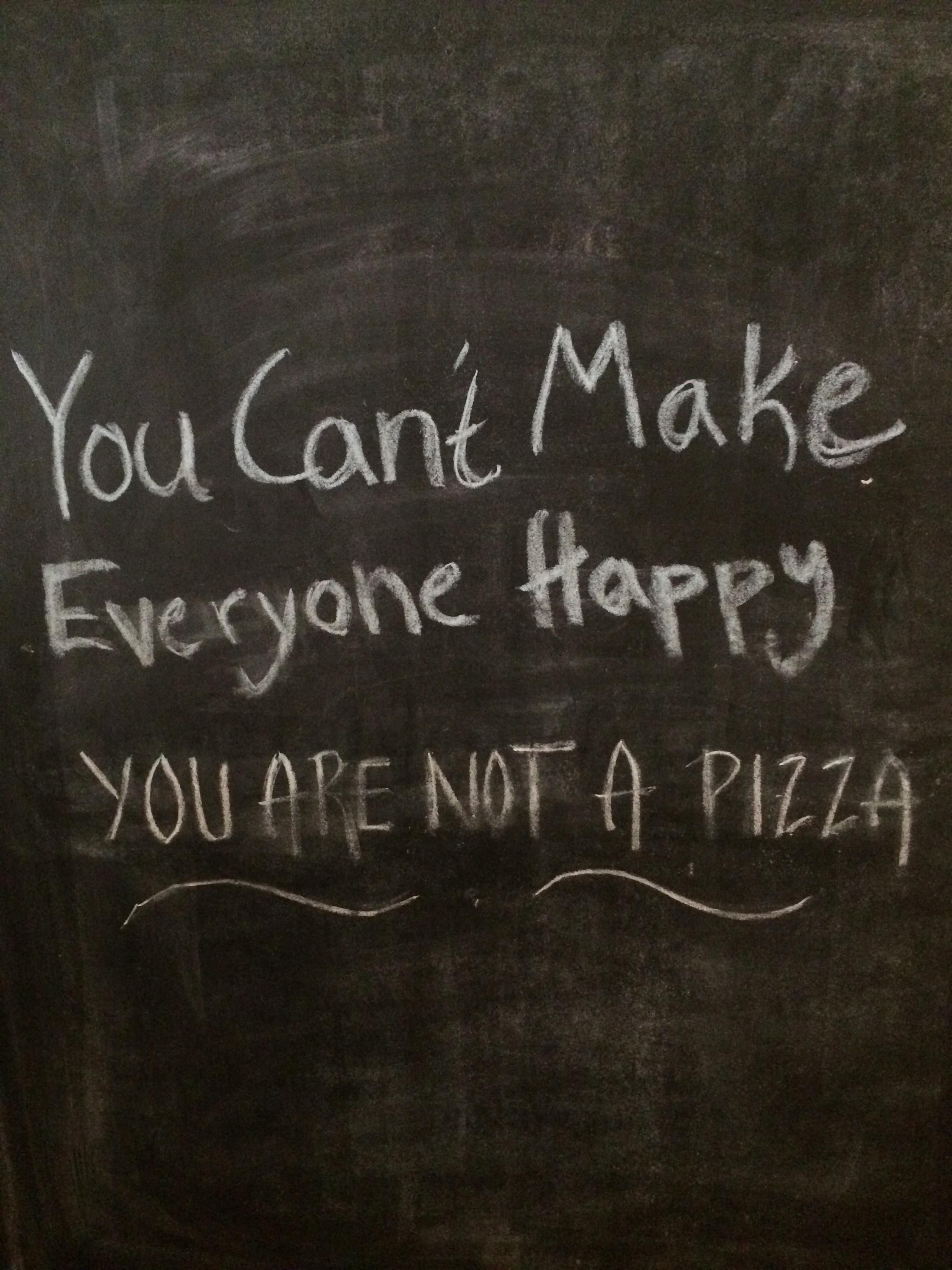 A sign at a local pizza place