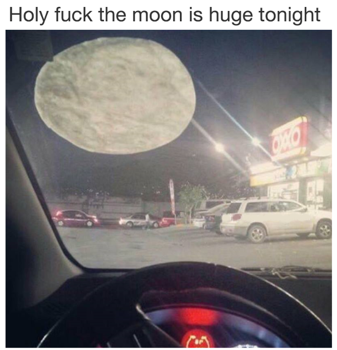 Huge moon in the night sky