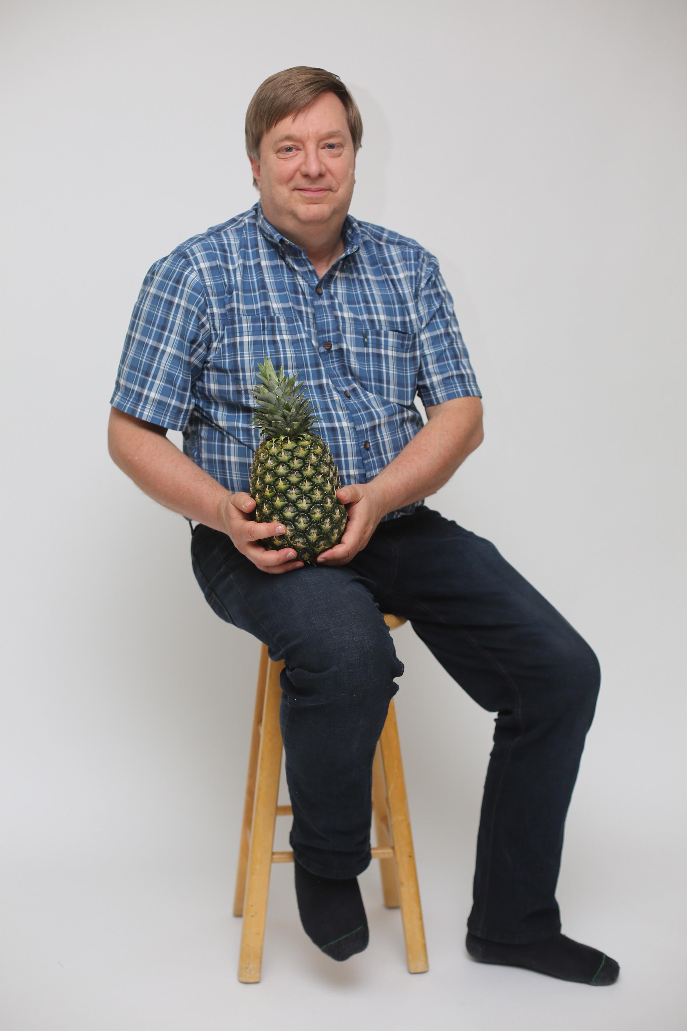 My dad has been trying to grow pineapples for the last year, today he succeeded, look how proud he is.