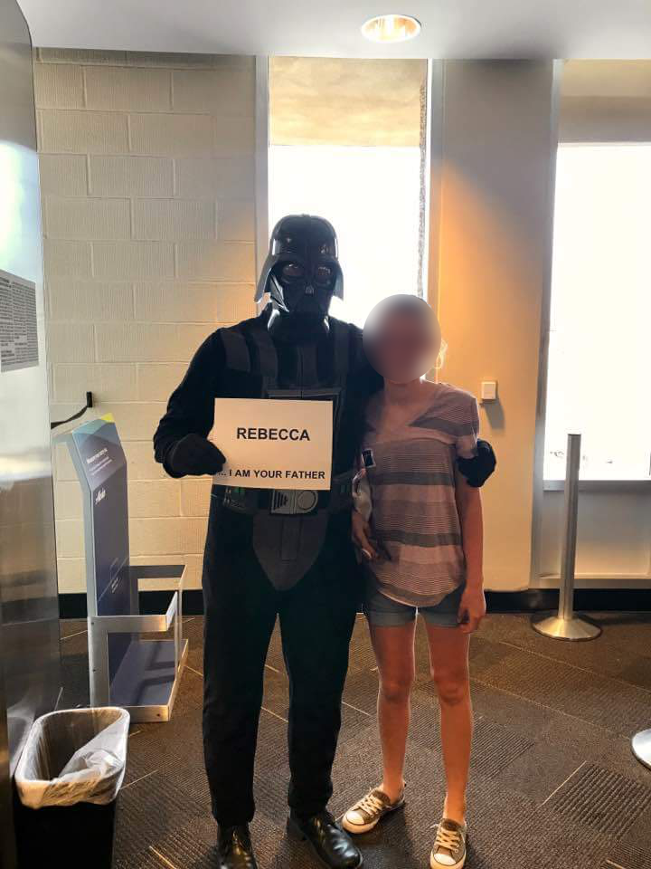 My friend's daughter just flew by herself for the first time. This was how he greeted her at the airport.