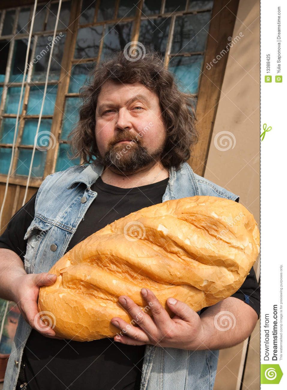 This is a stock image of a man with bread. He doesn't care and neither should you.