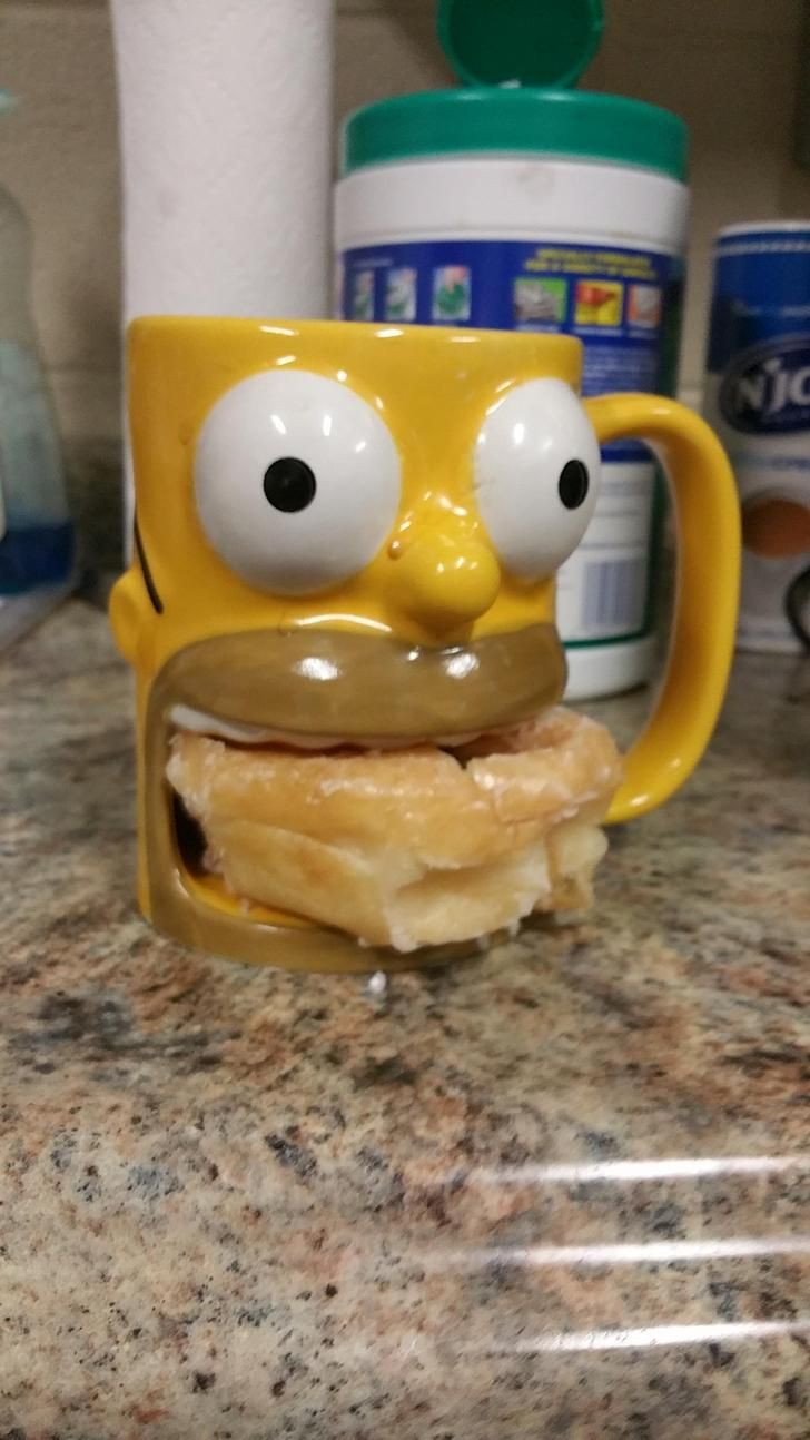 My Friend's coffee mug holds a donut.