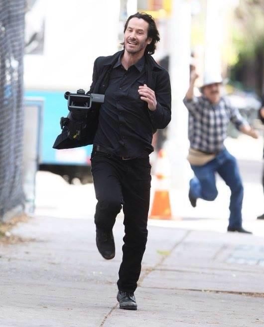 Anyway here's Keanu Reeves running off with a camera he just stole from the paparazzi.