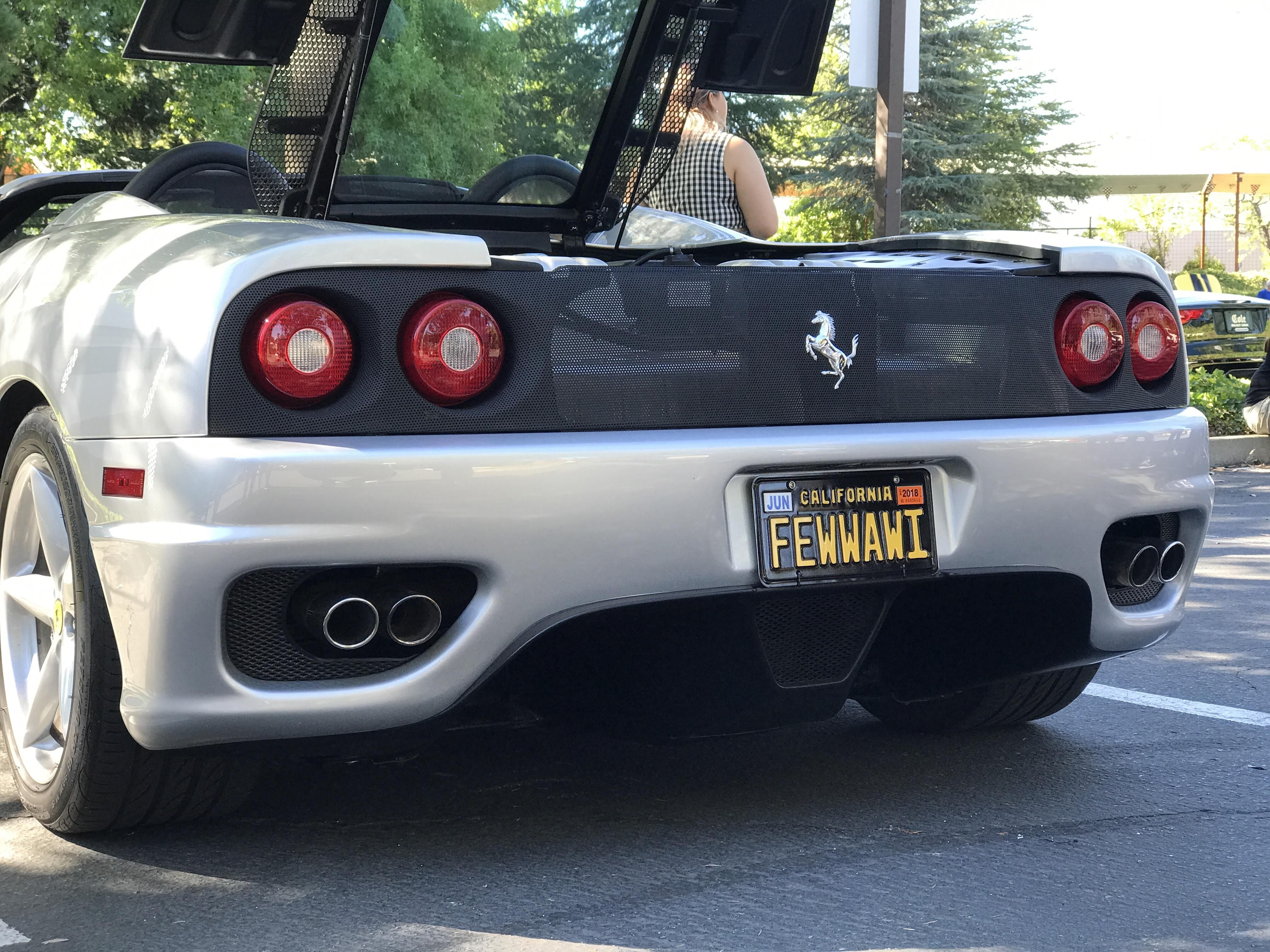 Yes, he was Asian. Yes, he had a great sense of humor. Yes, it's a Ferrari.