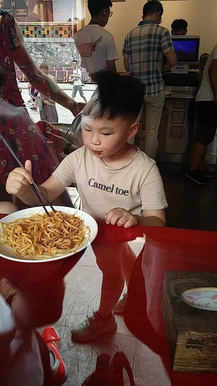 Friend visiting China is taking in the culture