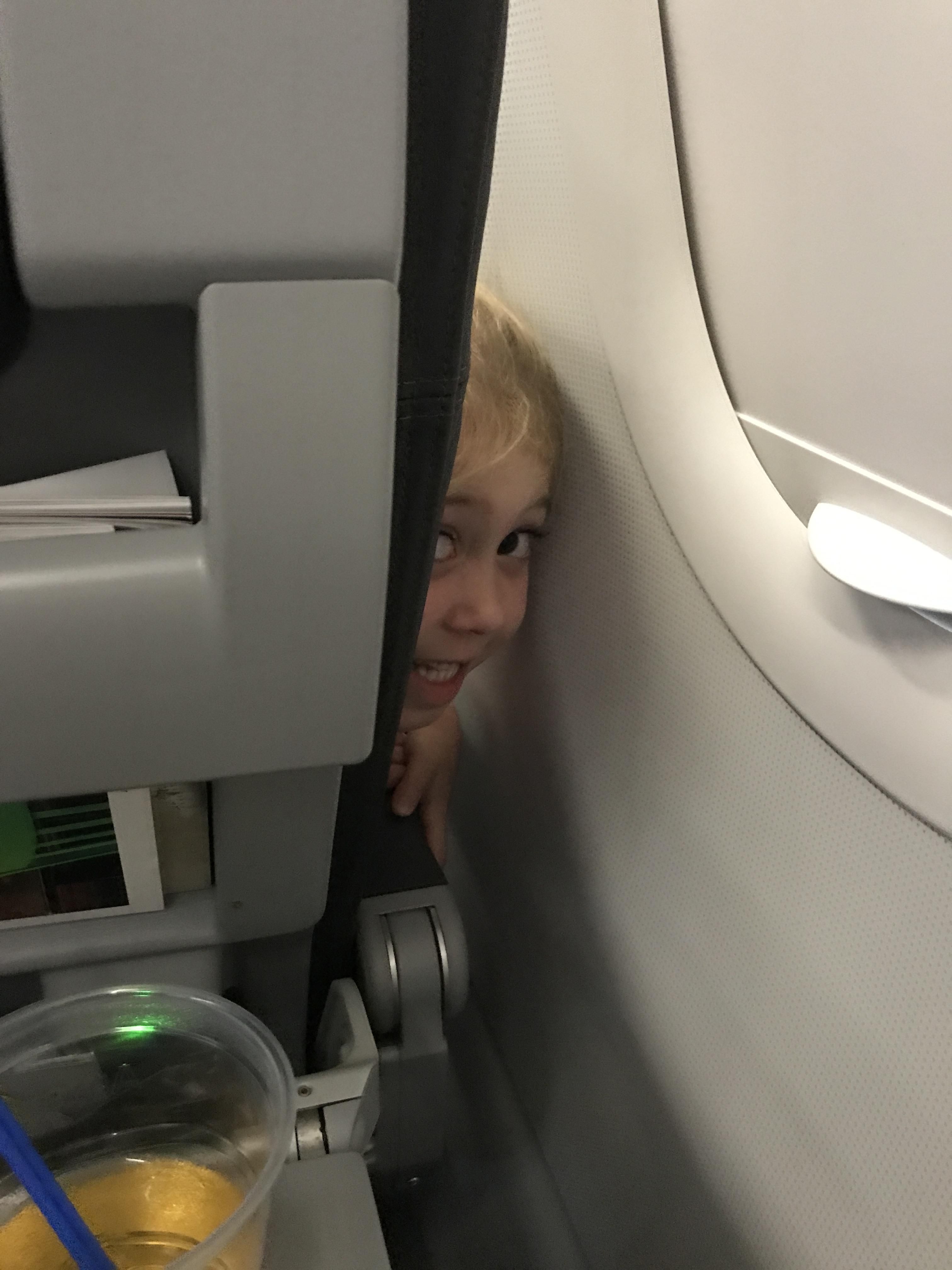 The girl in front of me was excited about her first flight. This was how we spent the entire two hours.