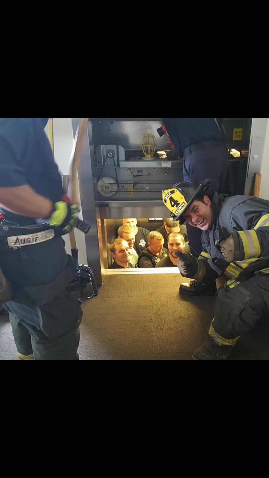 Kansas City fire department saves Kansas City police department from elevator.