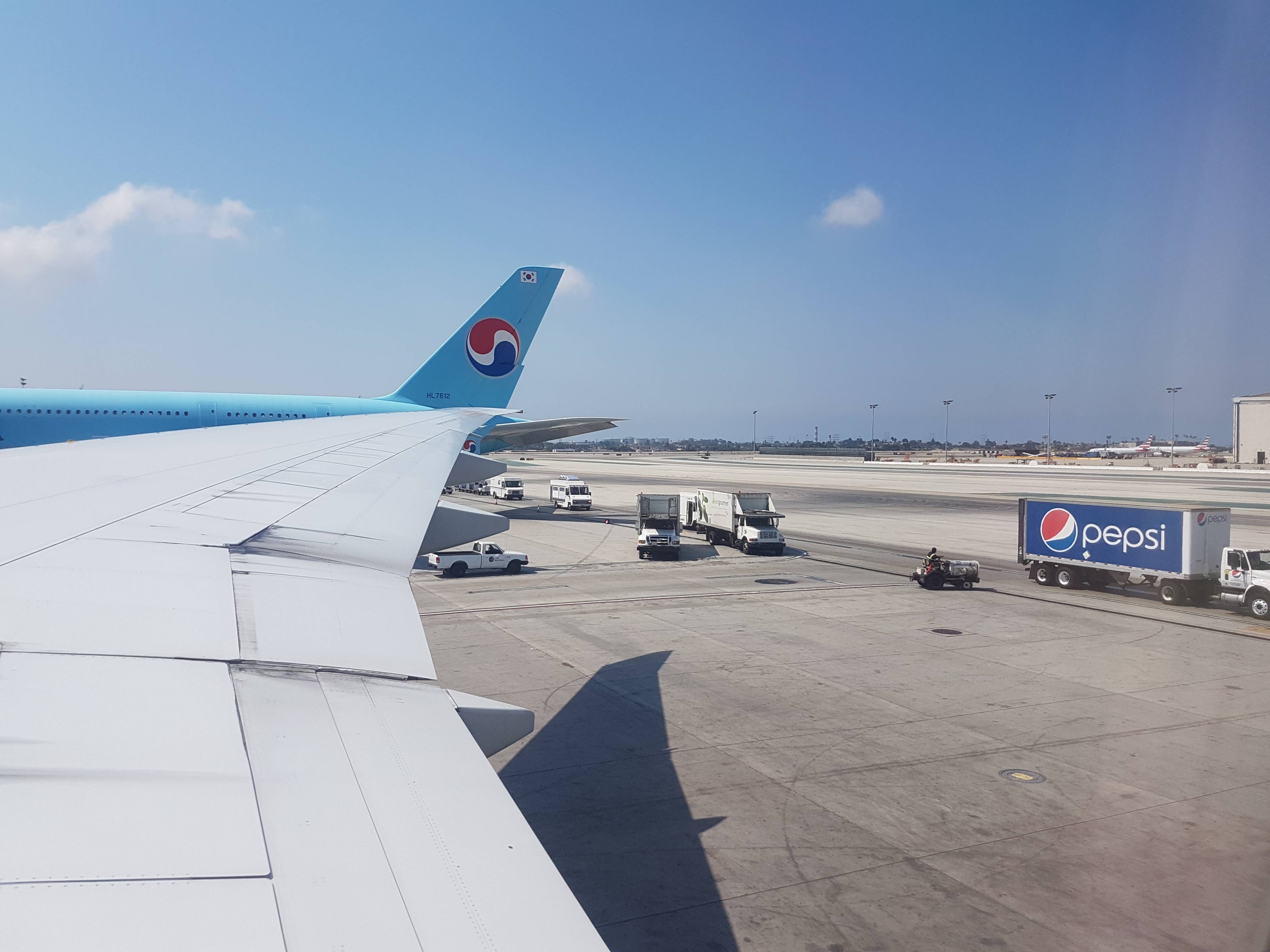 I said to my wife, Korean air looks like the Pepsi symbol when all of a sudden