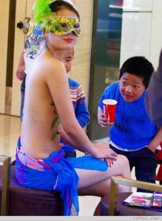 This kid really loves body paint !!