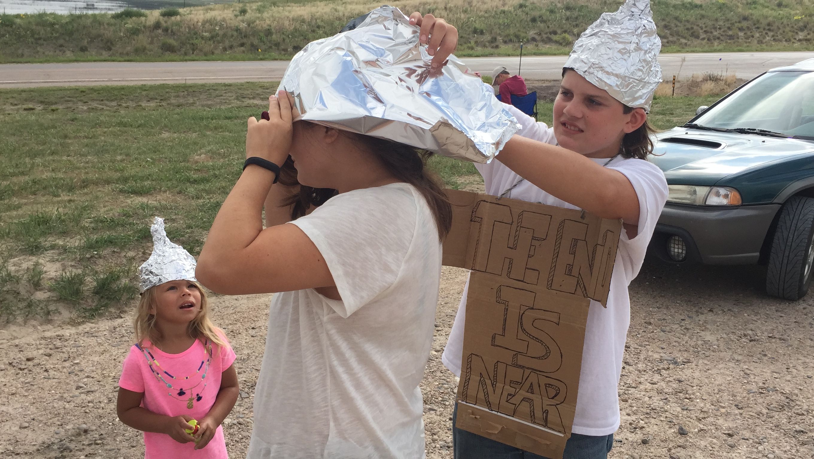 This kid at a gas station in Nebraska was giving out "Free solar hats to protect you from the UV radiation."