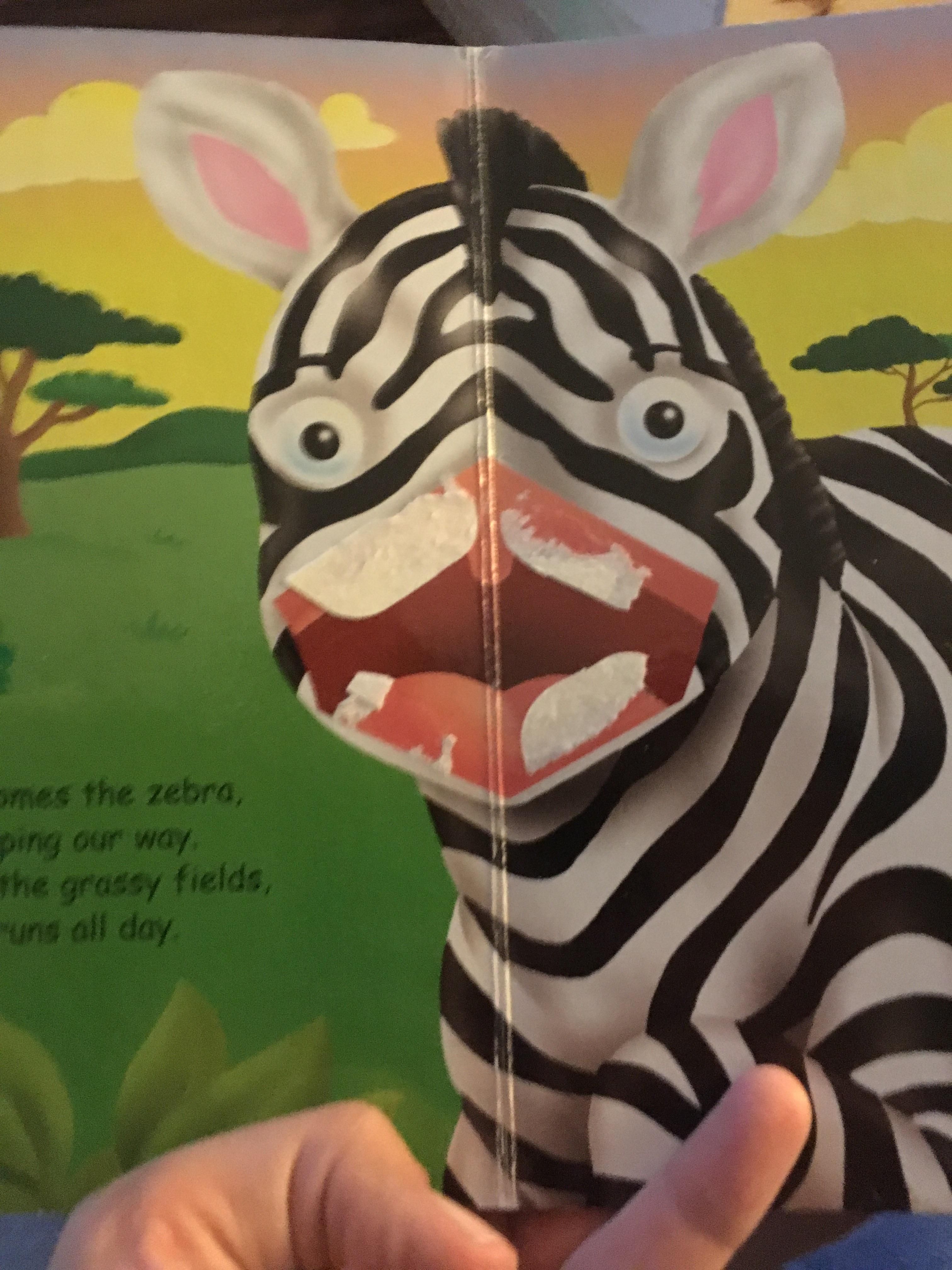 My son pulled the "pop ups" out of this book and it's a special kind of terrifying.