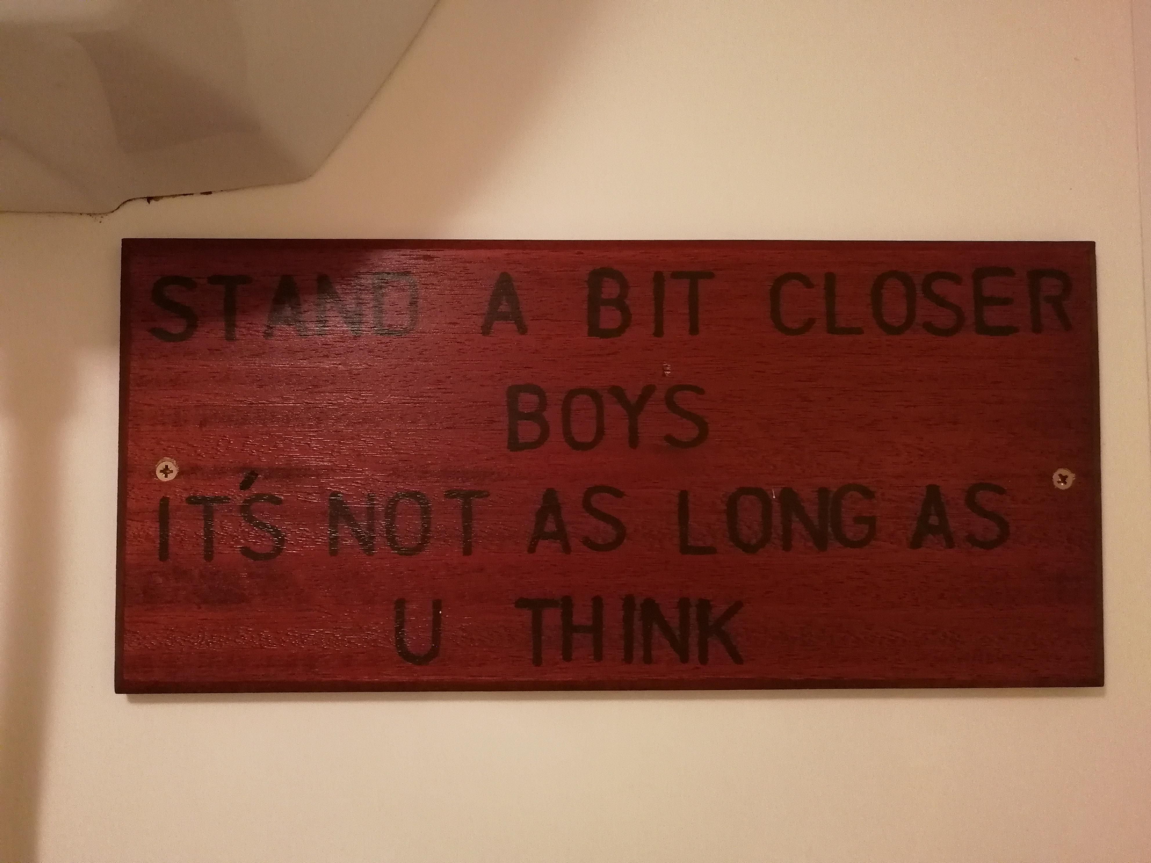 Sign in the men's toilets in a Scottish pub