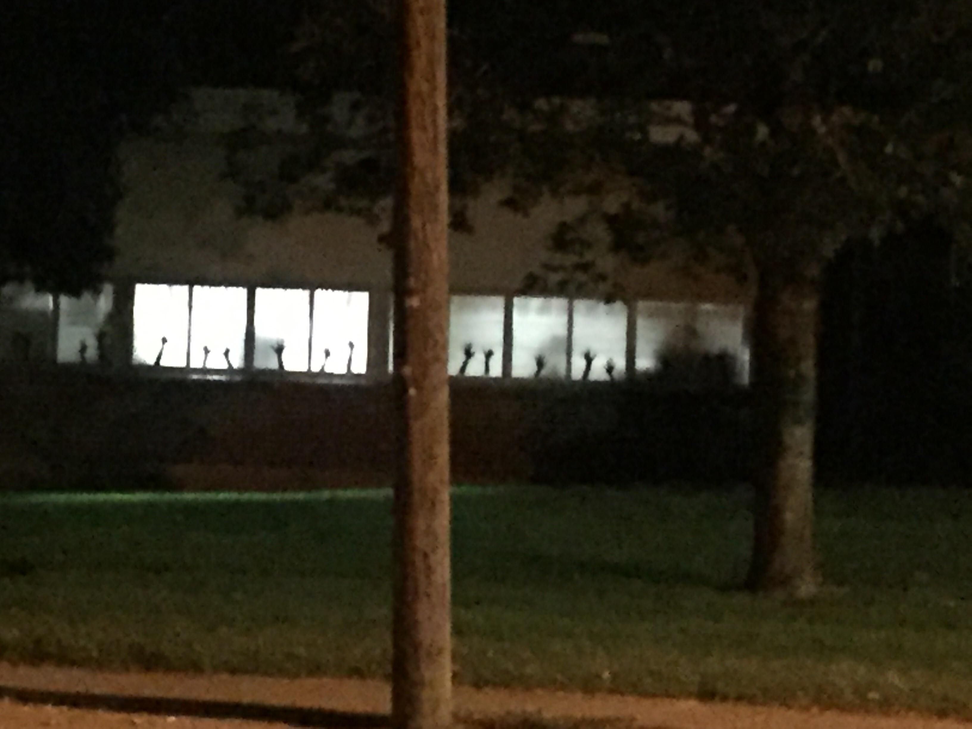 Kindergarten teacher had students trace their hands for the window....creepier than intended