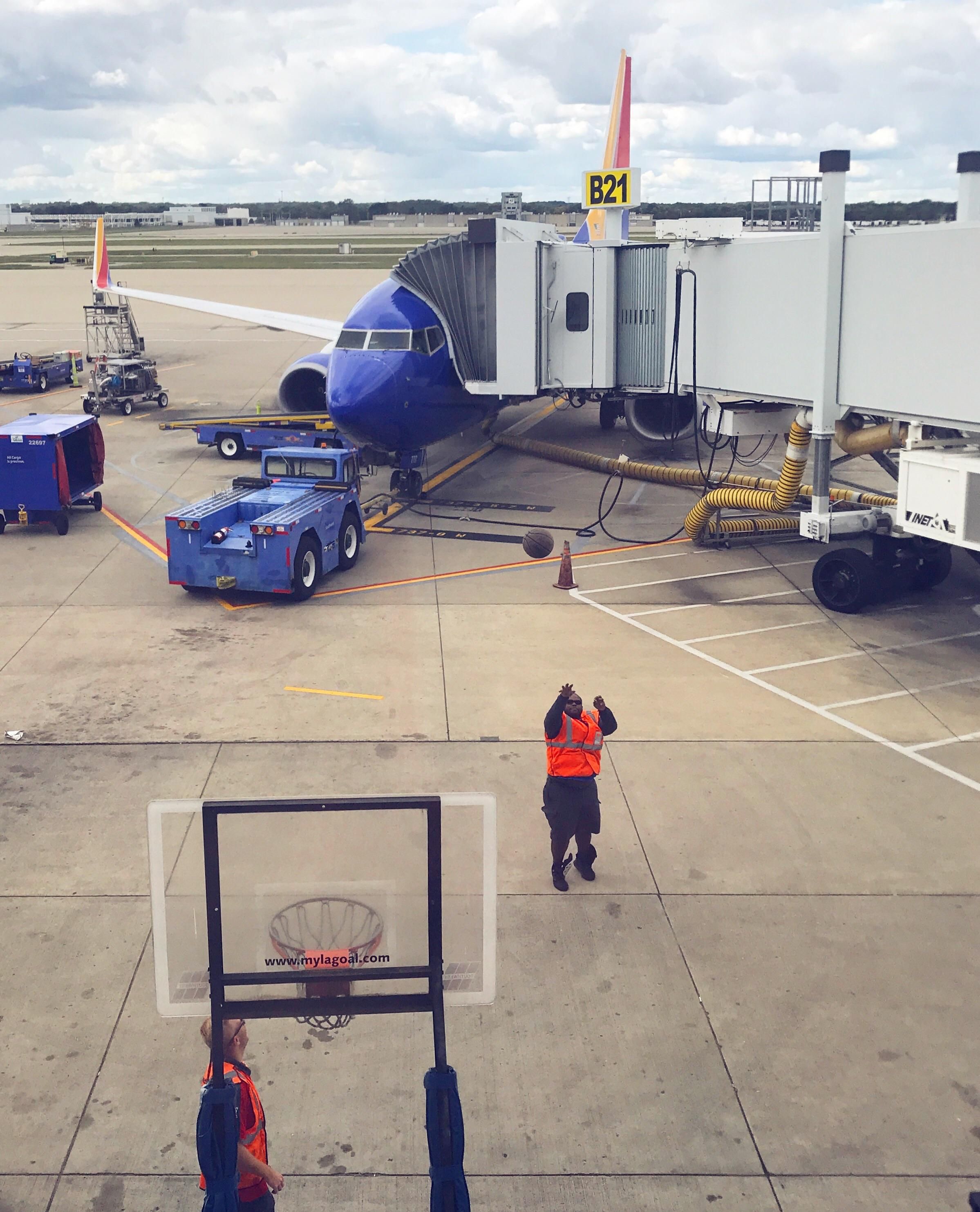 In Indiana you know it's gonna be a long flight delay when the ground crew breaks out the basketball.