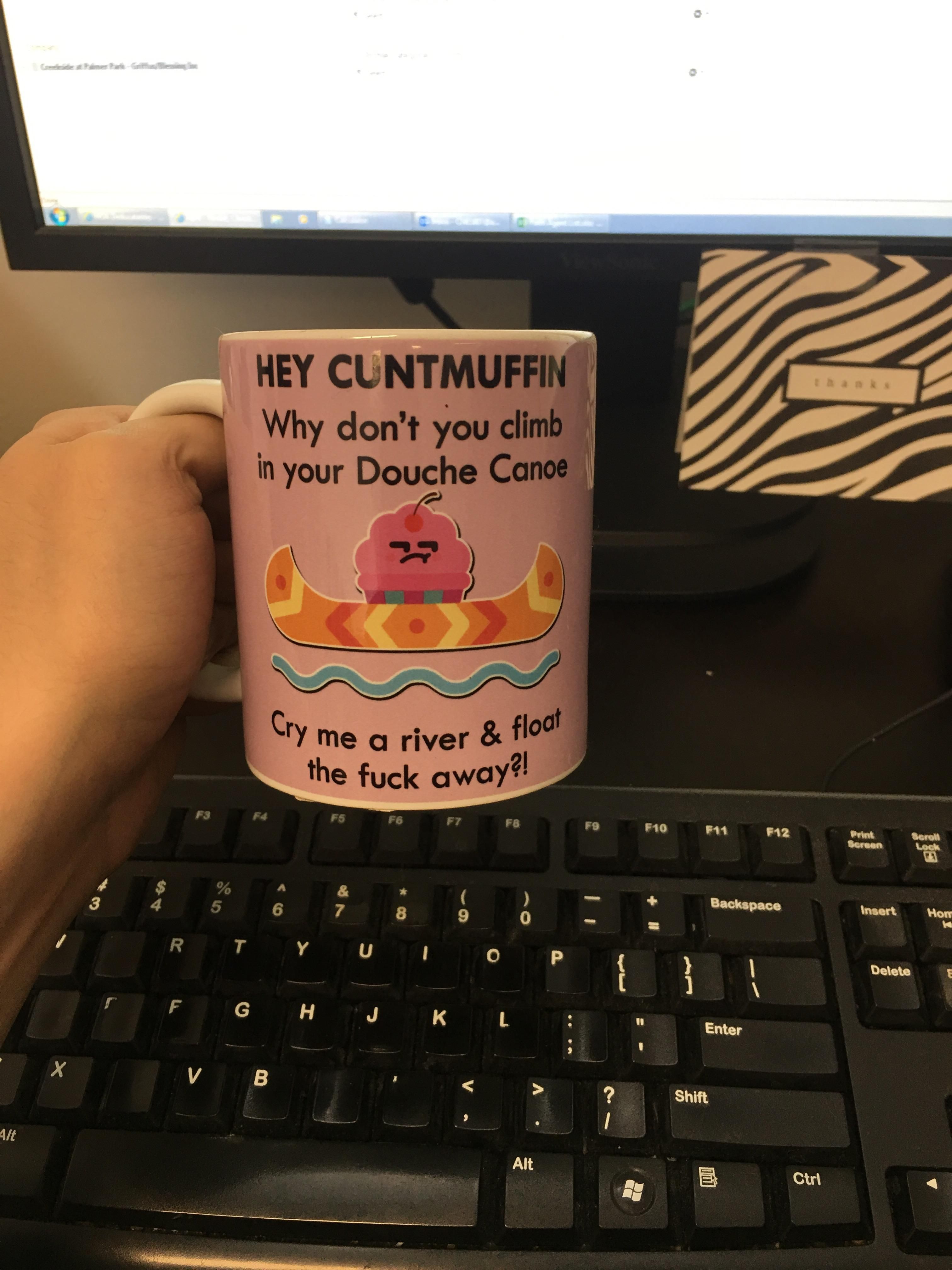 A co-workers coffee cup