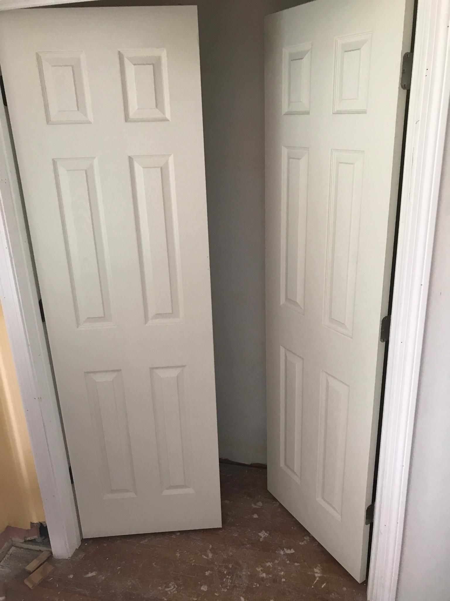 My friends carpenter saw nothing wrong with how he installed the closet doors.