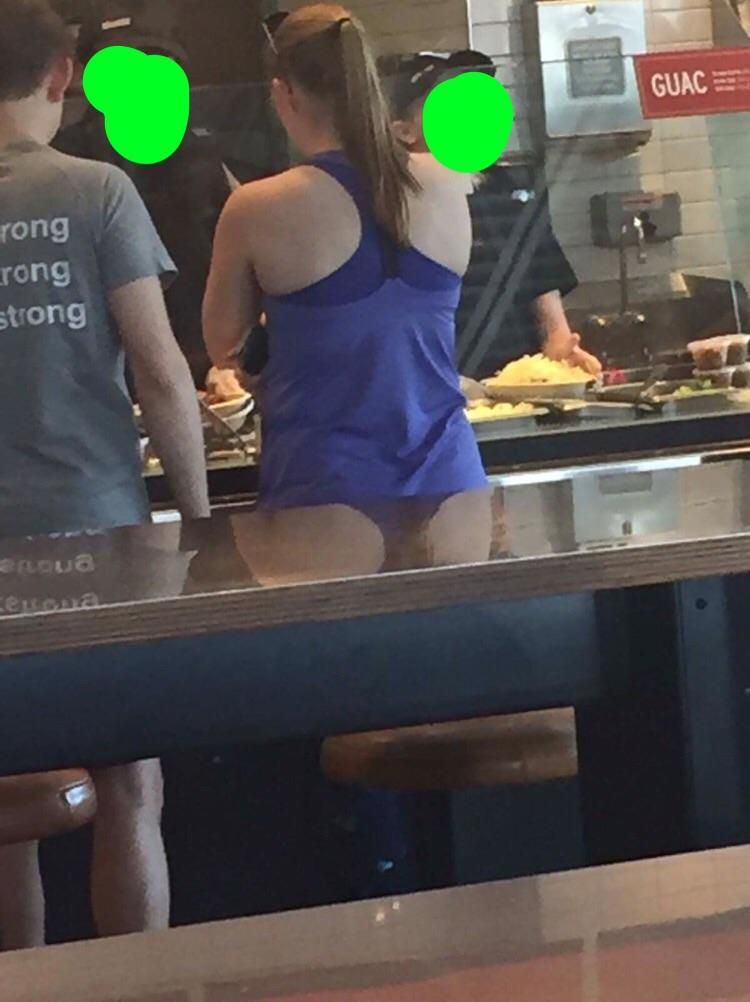 The reflection makes it look like this lady is wearing a thong.