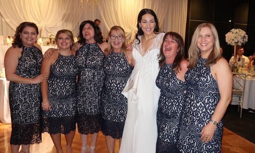 When six women wearing the same dress to a wedding aren't the bridesmaids. Awks!