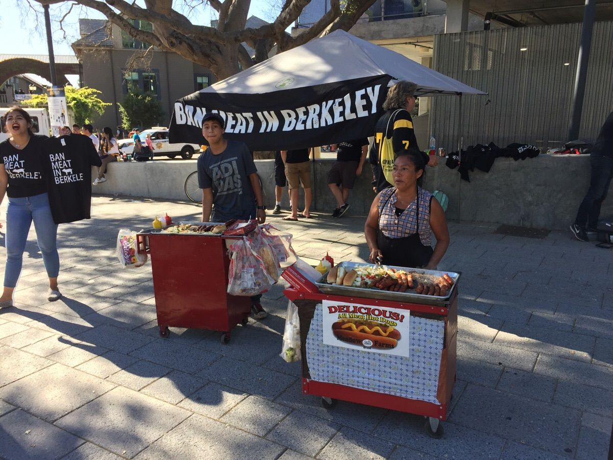 Entrepreneurs selling hot dogs in front of a Ban Meat at Berkeley stand