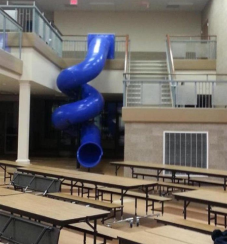 This School Has An Awesome Slide to get downstairs