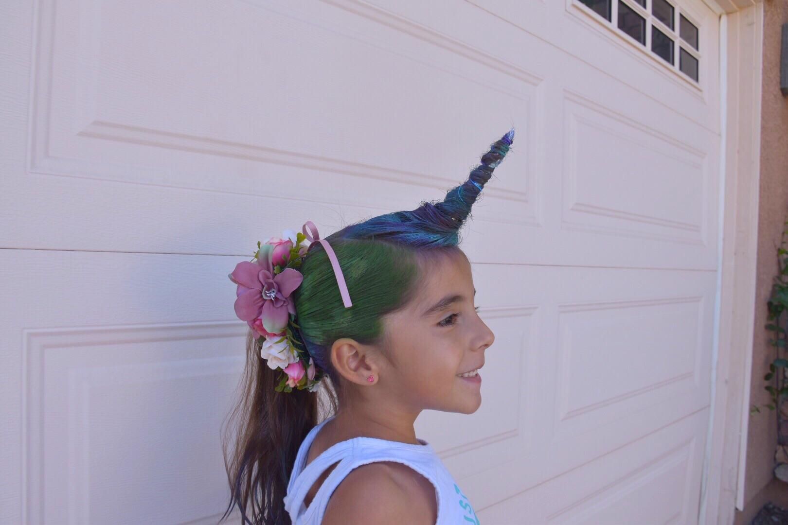 Not to be outdone. My niece was a unicorn for crazy hair day 10/6/2017.