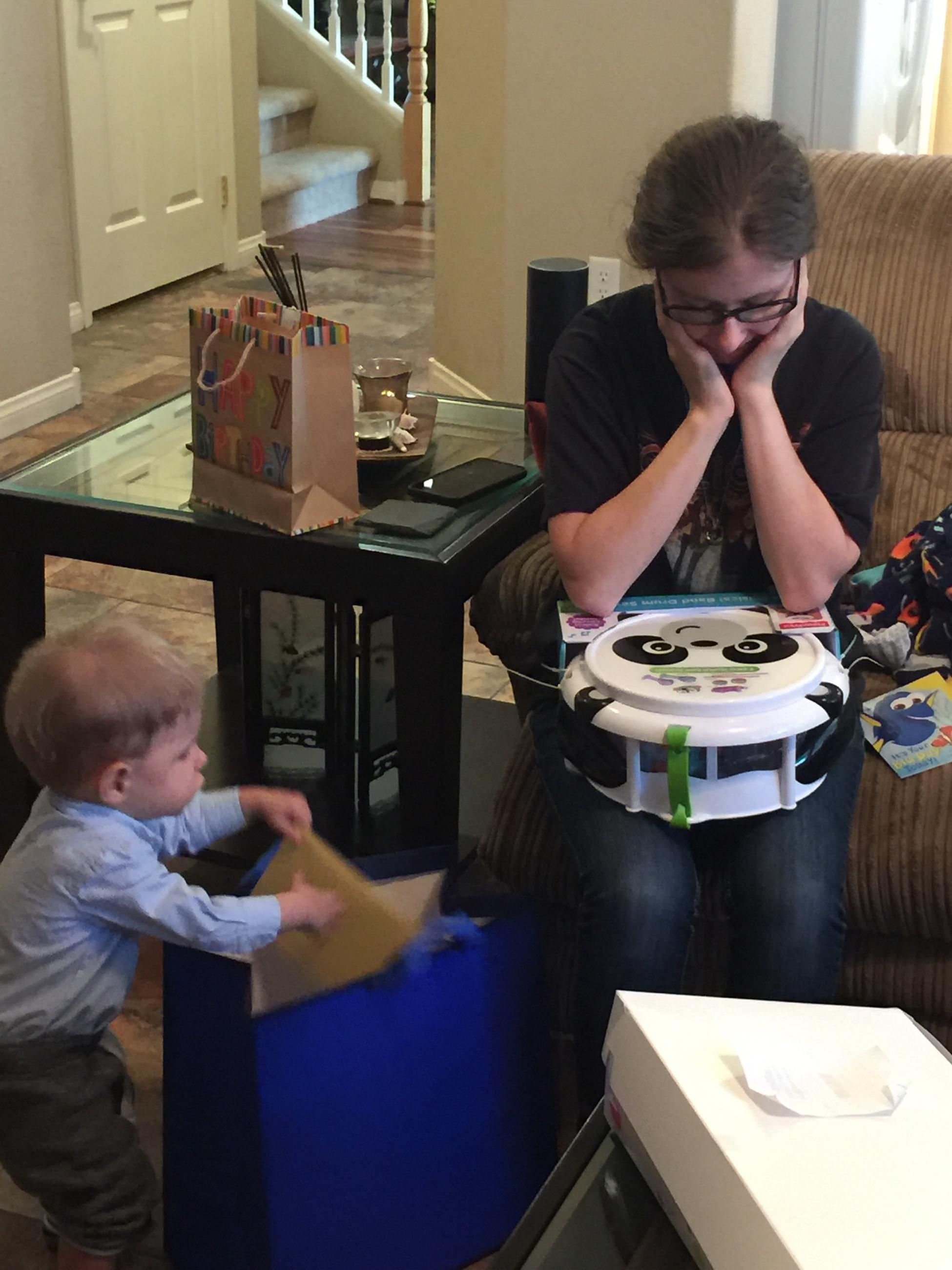 The moment your daughter realizes you bought the grandson musical instruments for his birthday