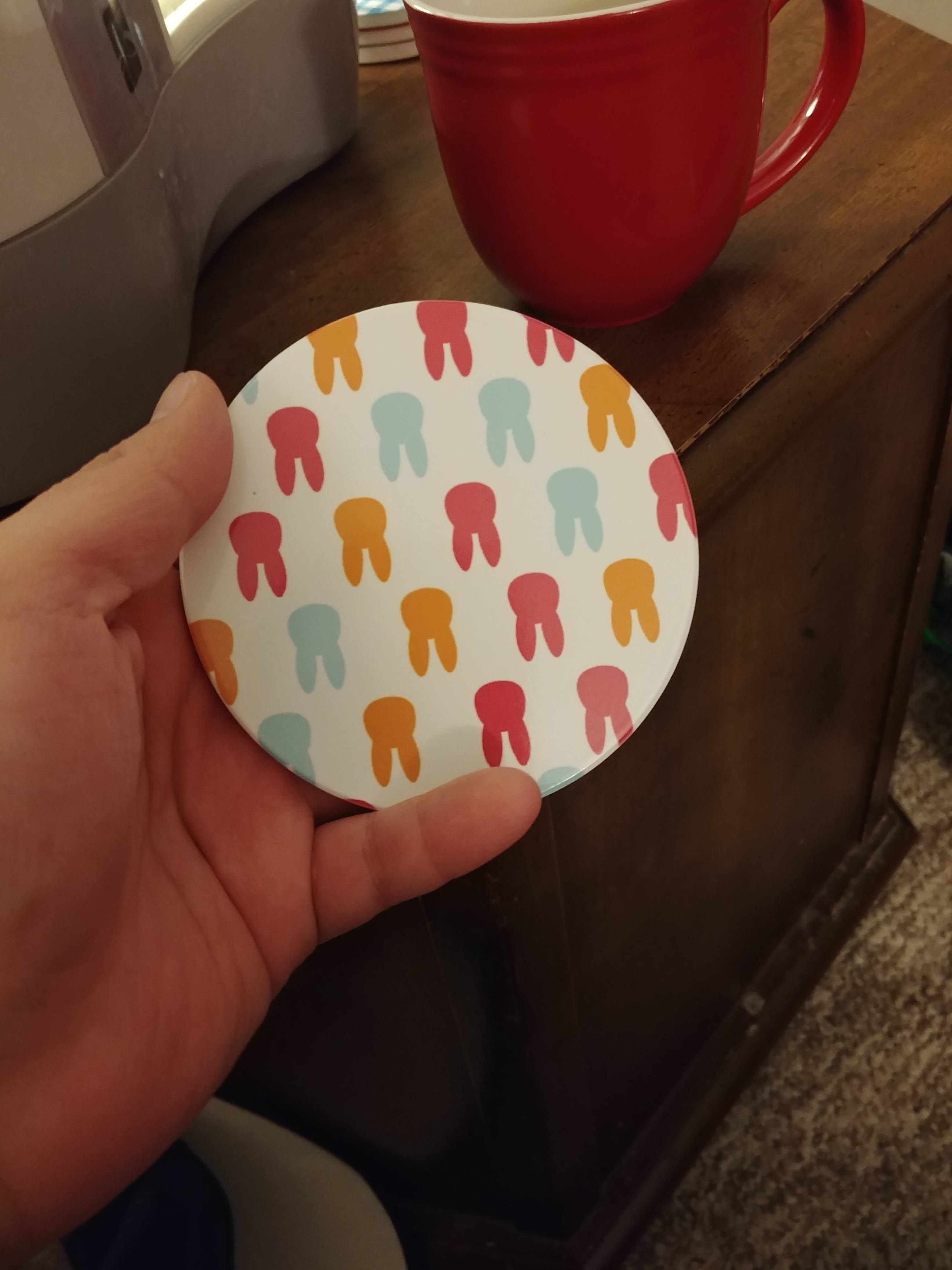 I've had this weird tooth coaster for years... Today realized I'm a total idiot