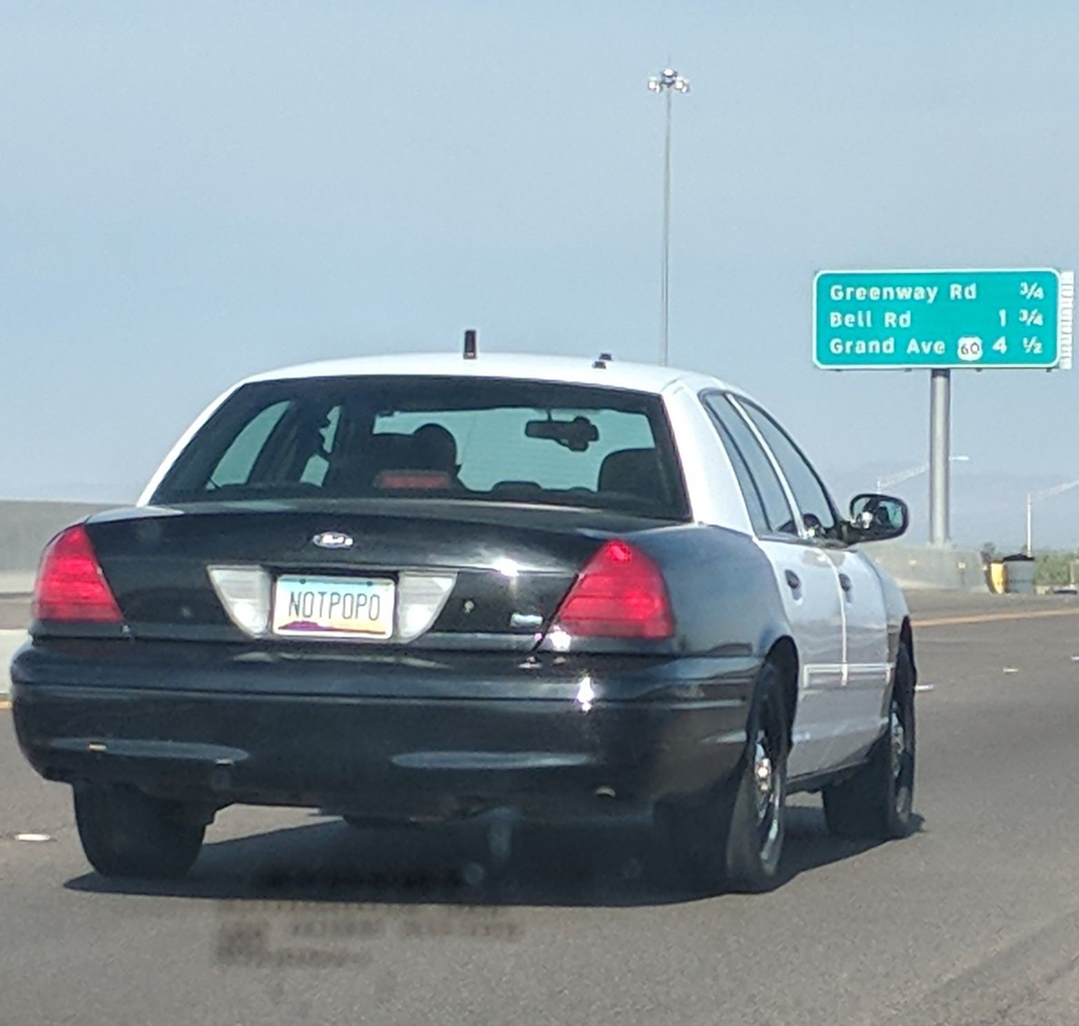 The license plate on this retired police car.