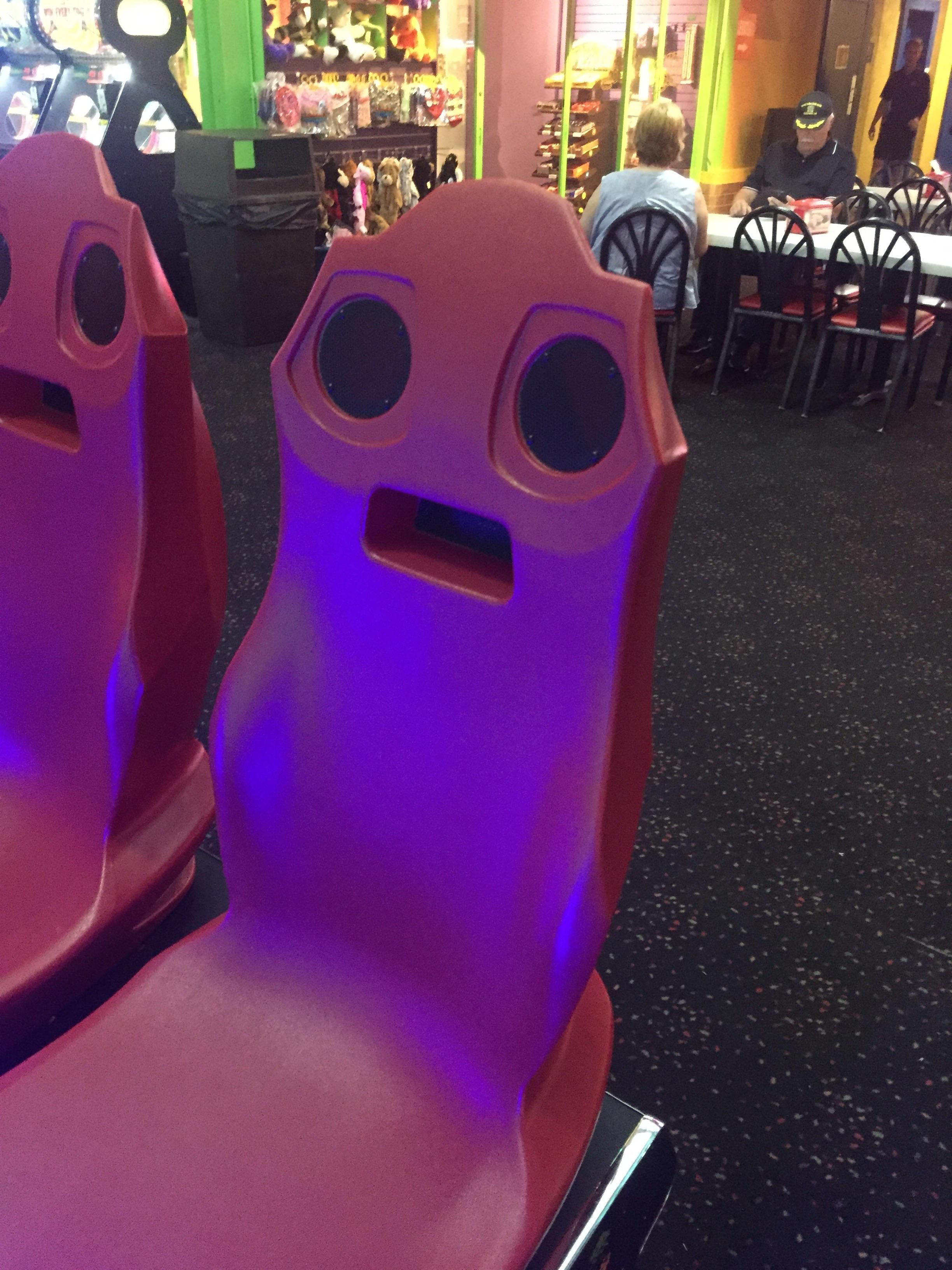 These arcade game seats have seen things