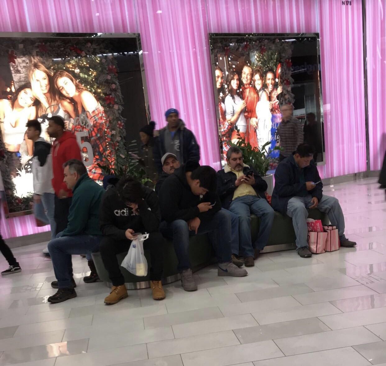 All the miserable men outside of Victoria’s Secret before the holidays.