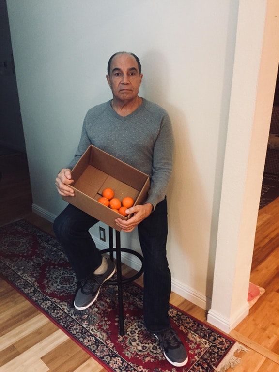 A few days ago, I shared a photo of my stepdad proudly holding the oranges that his tree grew. People asked him to pose like Pineapple Dad. It took some convincing, but he finally said yes.